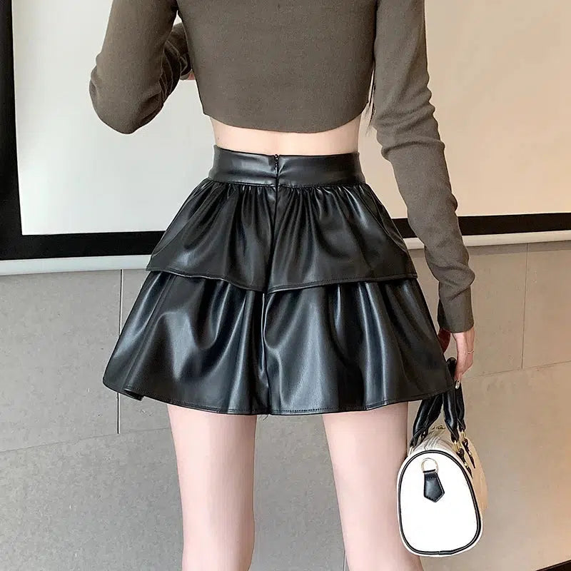 Y2K Faux Leather A-Line Mini Skirt - Retro 90s Grunge Style Y2K Faux Leather A-Line Mini Skirt - Retro 90s Grunge Style