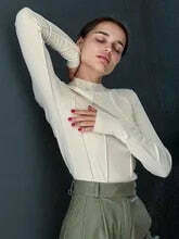 Coquette Aesthetic Kristell Turtleneck: Y2K Fashion Top for Women Coquette Aesthetic Kristell Turtleneck: Y2K Fashion Top for Women