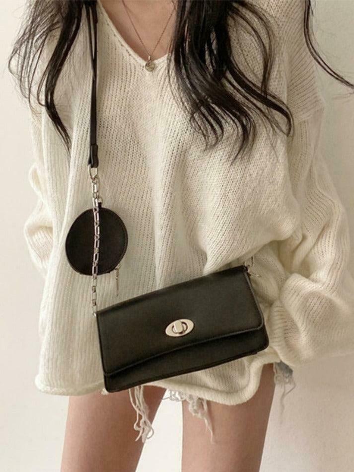 Coquette Aesthetic V-Neck Sweater: Y2K Fashion Loose Fit with Rolled Hem Detail Coquette Aesthetic V-Neck Sweater: Y2K Fashion Loose Fit with Rolled Hem Detail