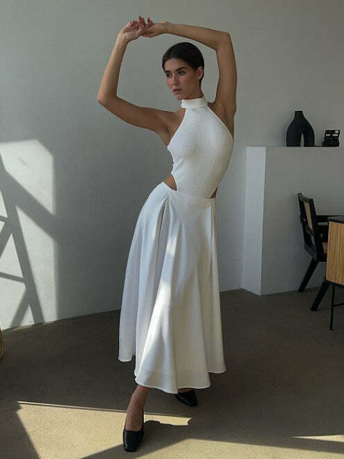 Vintage-inspired high-waisted satin maxi skirt for a timeless and chic look Vintage-inspired high-waisted satin maxi skirt for a timeless and chic look