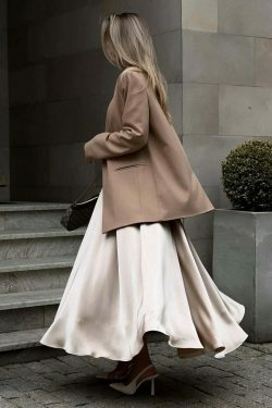 Vintage-inspired high-waisted satin maxi skirt for a timeless and chic look