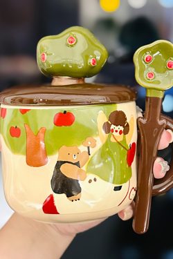 Adorable Ceramic Apple Tree Girl Mug with Lid and Spoon - Artistic High-Value Coffee Cup for Home and Office Use