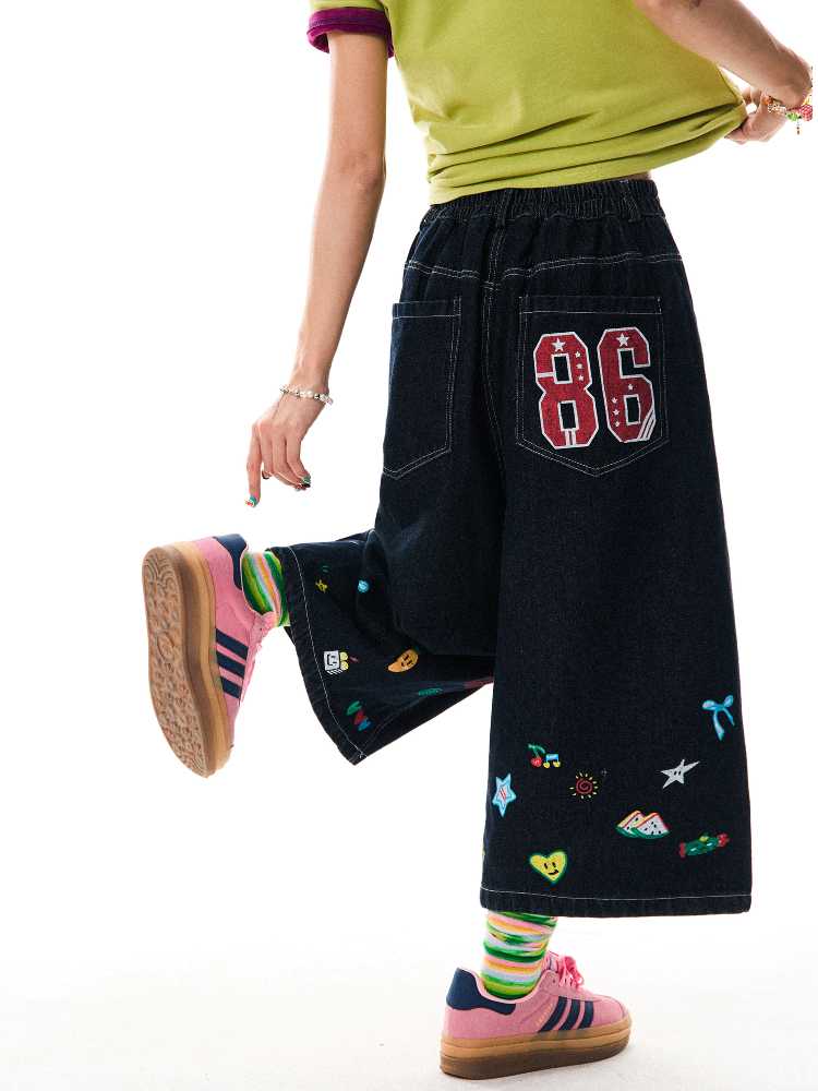 American Retro Cartoon Printed Denim Shorts for Women - Loose Fit, Versatile Seven-Point Wide-Leg Style American Retro Cartoon Printed Denim Shorts for Women - Loose Fit, Versatile Seven-Point Wide-Leg Style