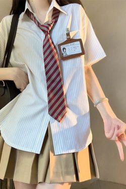 Four-Piece JK Uniform Set for Women: Striped Long Sleeve Shirt, Loose Fit, Pleated Skirt - Trendy 2024 Autumn Style