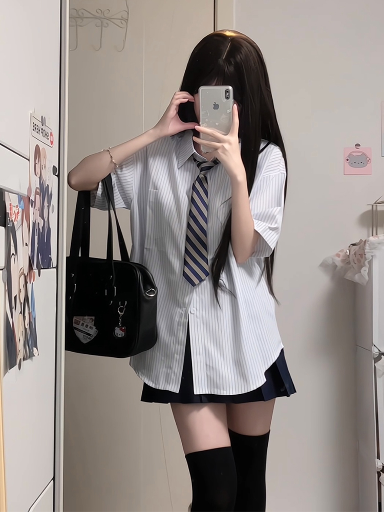 Four-Piece JK Uniform Set for Women: Striped Long Sleeve Shirt, Loose Fit, Pleated Skirt - Trendy 2024 Autumn Style Four-Piece JK Uniform Set for Women: Striped Long Sleeve Shirt, Loose Fit, Pleated Skirt - Trendy 2024 Autumn Style