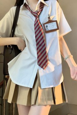Four-Piece JK Uniform Set for Women: Striped Long Sleeve Shirt, Loose Fit, Pleated Skirt - Trendy 2024 Autumn Style
