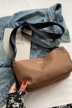 High-End Lightweight Nylon Crossbody Bag for Women - Portable Commuting Travel Style with Wide Strap