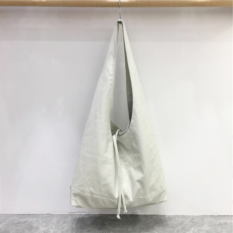 High-End Retro Soft Leather Triangular Tote Bag - Versatile Commuter Shoulder Bag for Work, Korean Style Fashion Accessory High-End Retro Soft Leather Triangular Tote Bag - Versatile Commuter Shoulder Bag for Work, Korean Style Fashion Accessory