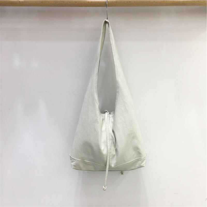 High-End Retro Soft Leather Triangular Tote Bag - Versatile Commuter Shoulder Bag for Work, Korean Style Fashion Accessory High-End Retro Soft Leather Triangular Tote Bag - Versatile Commuter Shoulder Bag for Work, Korean Style Fashion Accessory