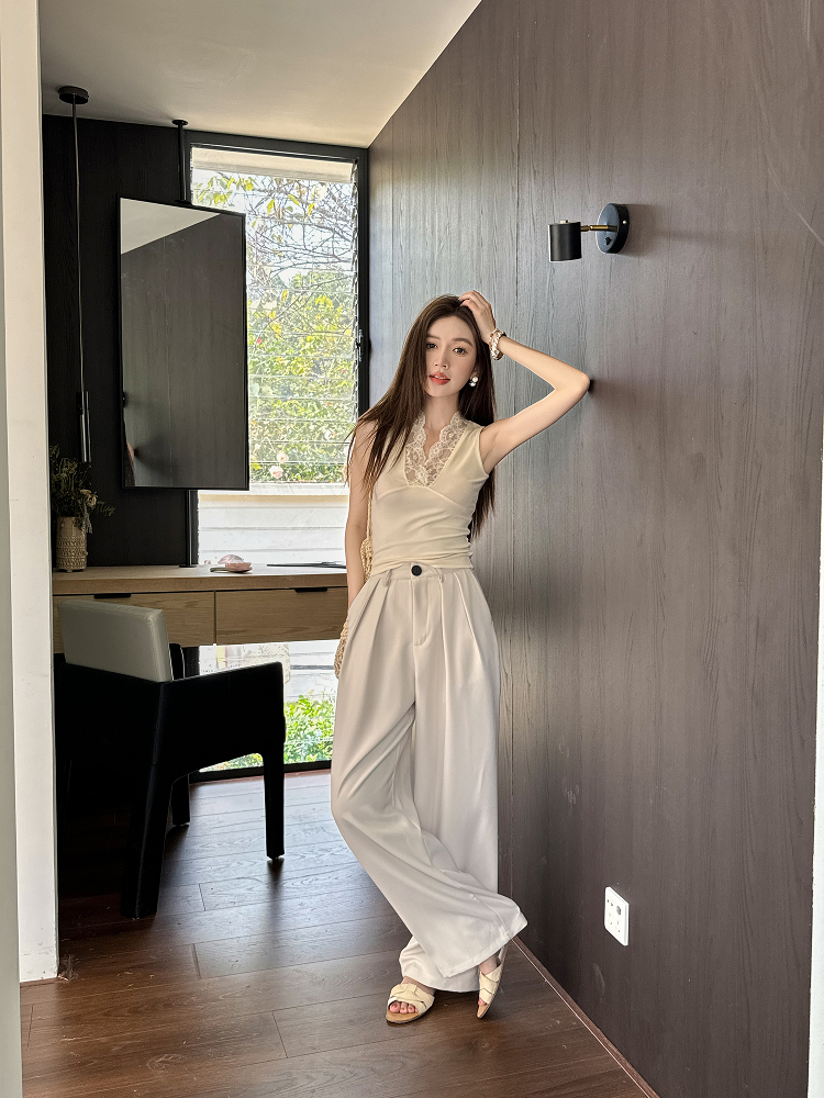 High-Waisted Loose Off-White Wide-Leg Pants for Women - Spring/Summer Floor-Length Draped Trousers in Light Fabric High-Waisted Loose Off-White Wide-Leg Pants for Women - Spring/Summer Floor-Length Draped Trousers in Light Fabric