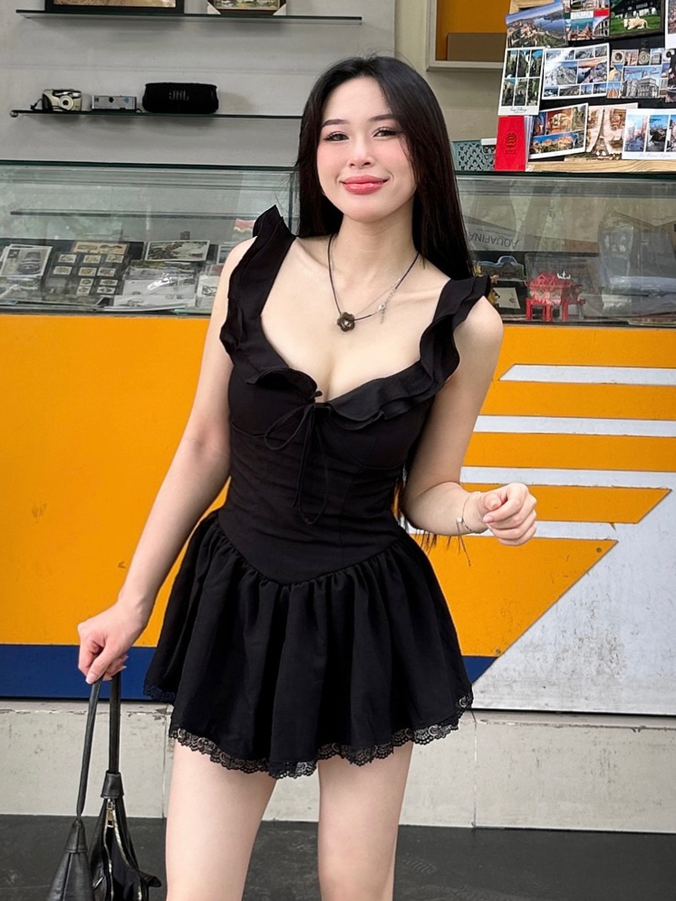 Low-Neck Little Black Dress for Women - Hepburn Style A-Line with Ruffled Hem, Lace Trim, and Pleated Short Skirt Low-Neck Little Black Dress for Women - Hepburn Style A-Line with Ruffled Hem, Lace Trim, and Pleated Short Skirt