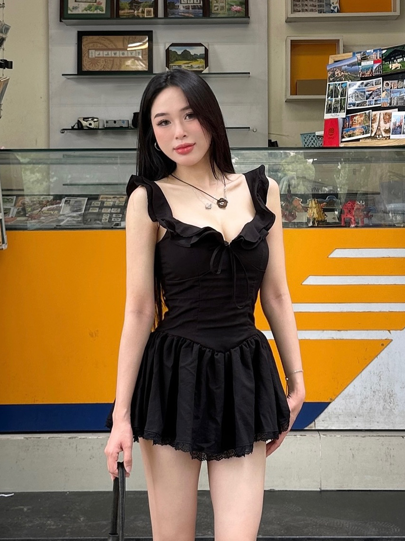 Low-Neck Little Black Dress for Women - Hepburn Style A-Line with Ruffled Hem, Lace Trim, and Pleated Short Skirt Low-Neck Little Black Dress for Women - Hepburn Style A-Line with Ruffled Hem, Lace Trim, and Pleated Short Skirt