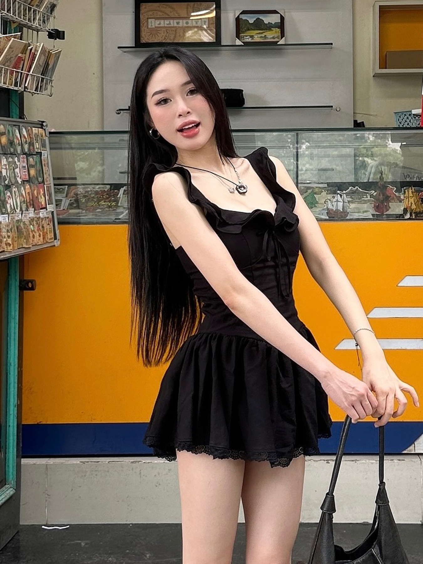 Low-Neck Little Black Dress for Women - Hepburn Style A-Line with Ruffled Hem, Lace Trim, and Pleated Short Skirt Low-Neck Little Black Dress for Women - Hepburn Style A-Line with Ruffled Hem, Lace Trim, and Pleated Short Skirt