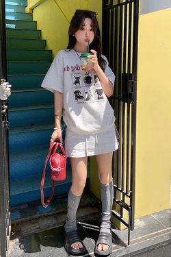 Plus-Size Cartoon Print Drawstring Short-Sleeve T-Shirt and High-Waisted Skirt Two-Piece Set - Trendy Summer Outfit for Women