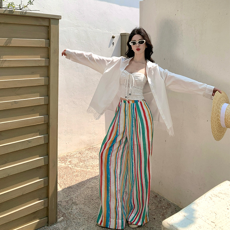 Rainbow Striped Wide-Leg Pants for Beach Vacation – Floor-Length Linen Pants with Sun Protection Cardigan in Lazy Style Rainbow Striped Wide-Leg Pants for Beach Vacation – Floor-Length Linen Pants with Sun Protection Cardigan in Lazy Style