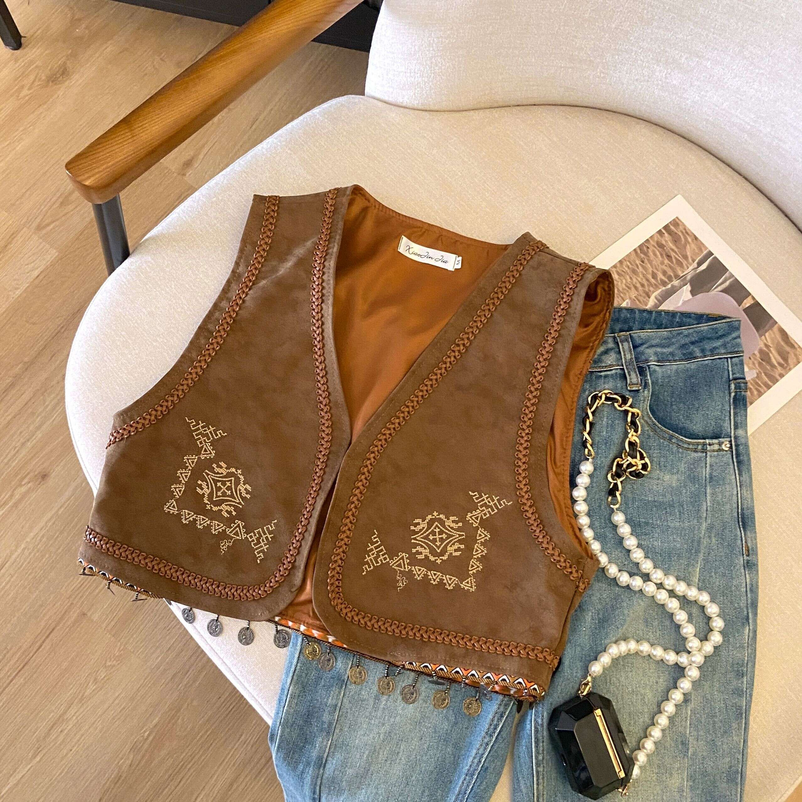 Retro PU Leather Embroidered Tassel Vest Jacket for Women - Loose Short Layered Style for Travel, Inspired by Hong Kong and Xinjiang Retro PU Leather Embroidered Tassel Vest Jacket for Women - Loose Short Layered Style for Travel, Inspired by Hong Kong and Xinjiang