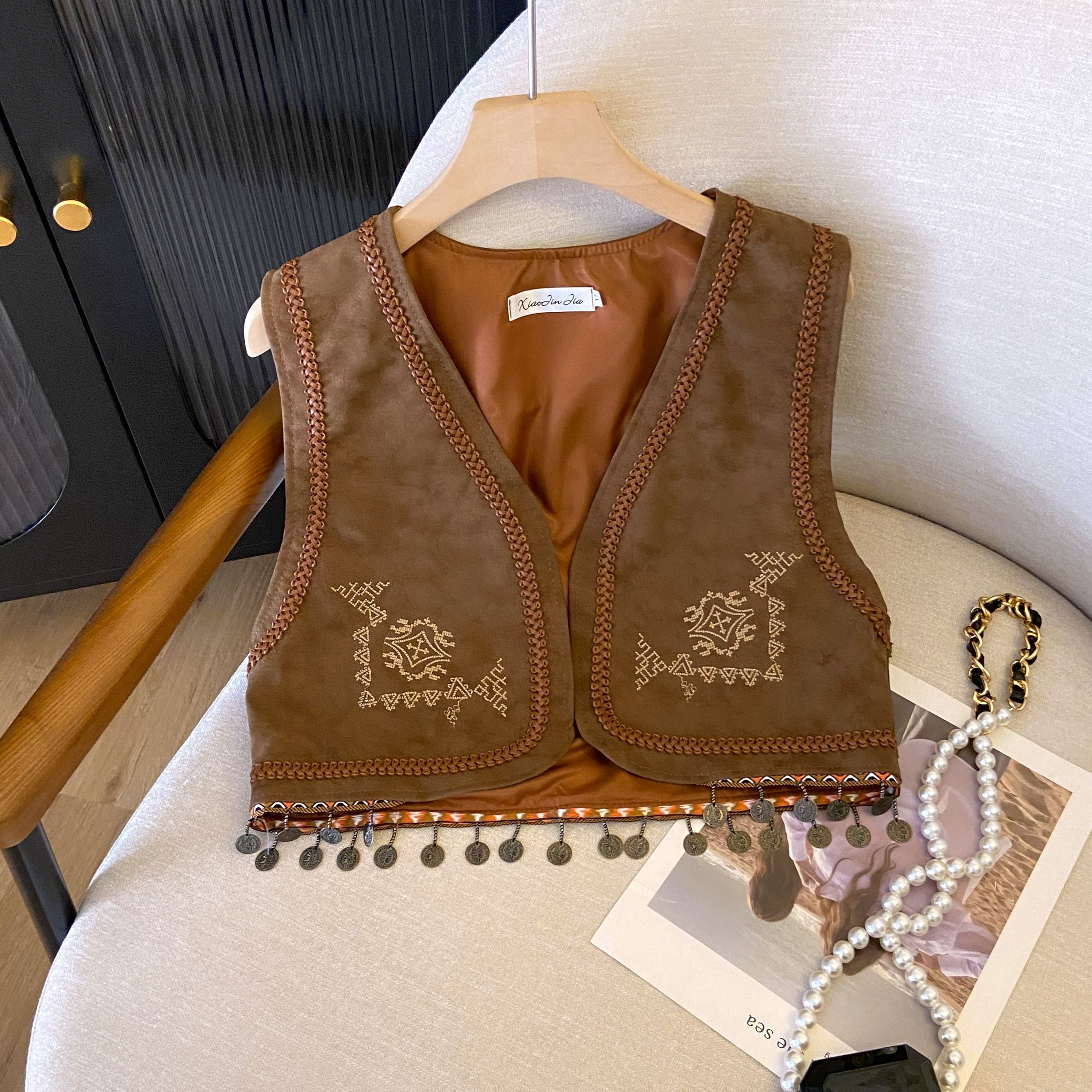 Retro PU Leather Embroidered Tassel Vest Jacket for Women - Loose Short Layered Style for Travel, Inspired by Hong Kong and Xinjiang Retro PU Leather Embroidered Tassel Vest Jacket for Women - Loose Short Layered Style for Travel, Inspired by Hong Kong and Xinjiang