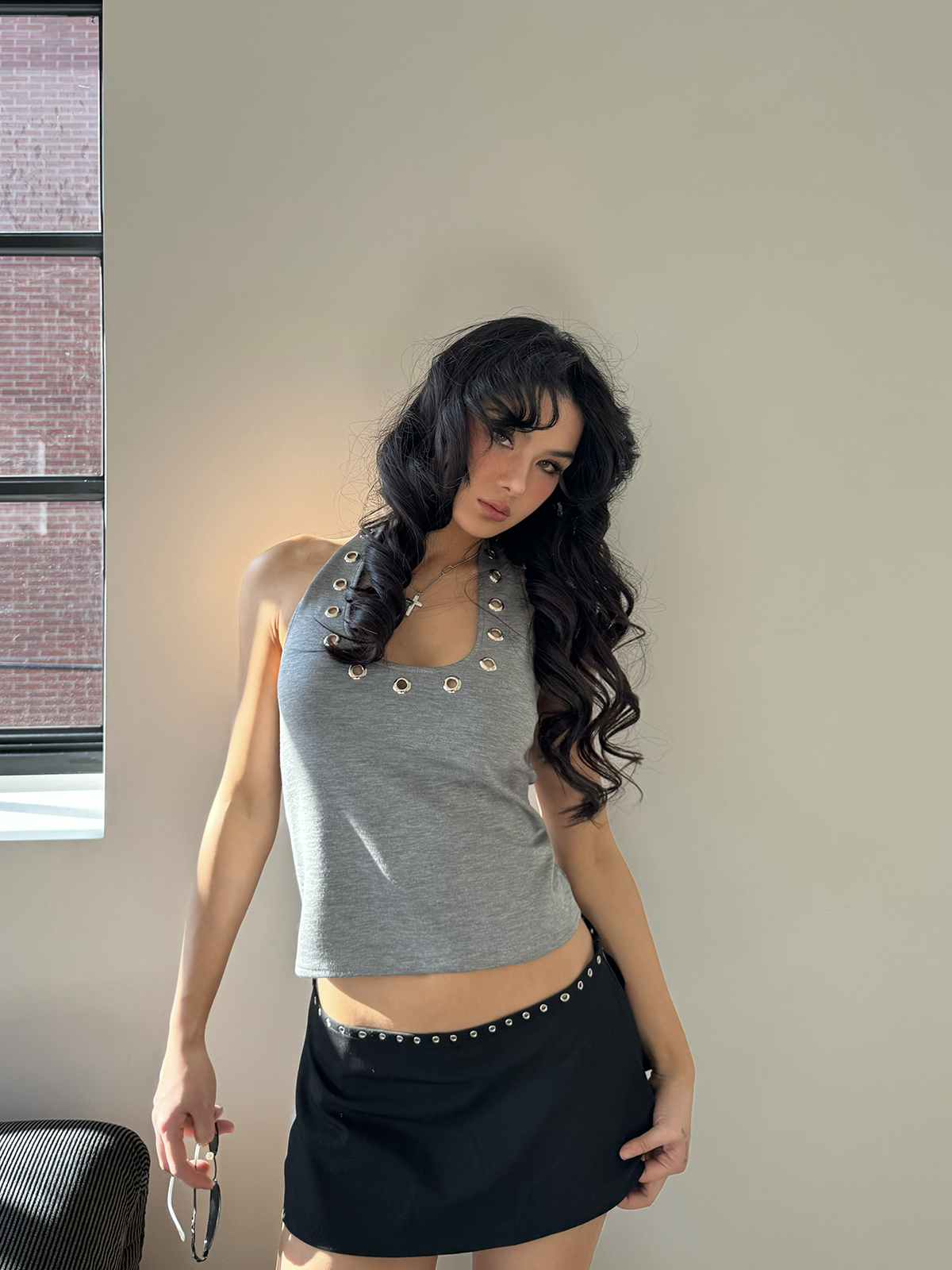 Silver Ring Eyelet Gray Vest with Black Skirt Pants – Stylish Girl Outfit, Y2K Fashion, Trendy Layered Look Silver Ring Eyelet Gray Vest with Black Skirt Pants – Stylish Girl Outfit, Y2K Fashion, Trendy Layered Look