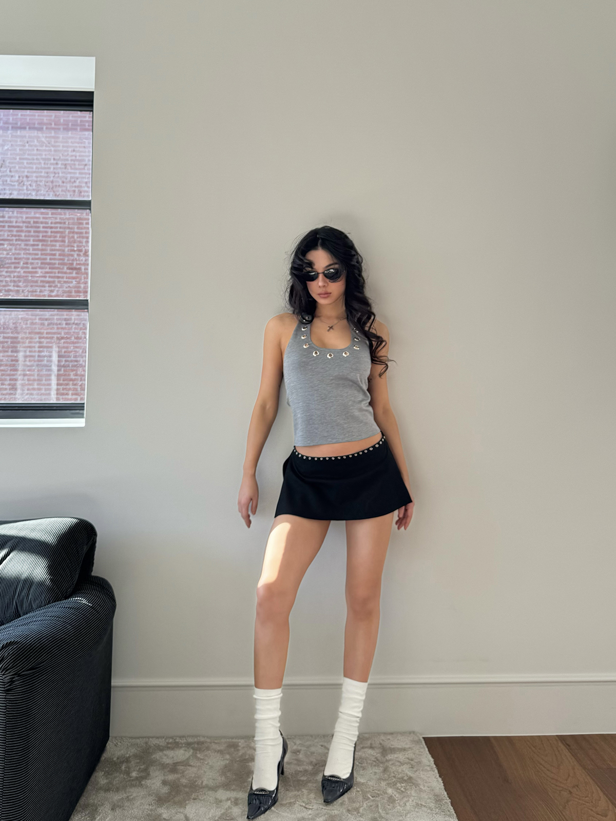Silver Ring Eyelet Gray Vest with Black Skirt Pants – Stylish Girl Outfit, Y2K Fashion, Trendy Layered Look Silver Ring Eyelet Gray Vest with Black Skirt Pants – Stylish Girl Outfit, Y2K Fashion, Trendy Layered Look