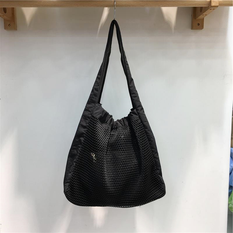 Soft Hollow Nylon Shoulder Tote Bag - Niche Design for Spring/Summer 2025 - Trendy Underarm Style for Everyday Use Soft Hollow Nylon Shoulder Tote Bag - Niche Design for Spring/Summer 2025 - Trendy Underarm Style for Everyday Use