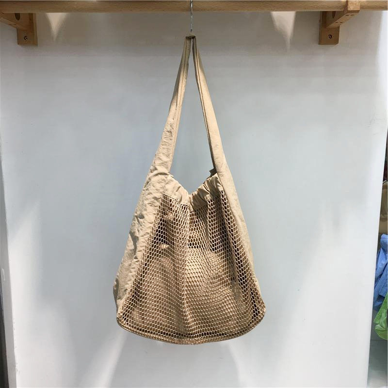 Soft Hollow Nylon Shoulder Tote Bag - Niche Design for Spring/Summer 2025 - Trendy Underarm Style for Everyday Use Soft Hollow Nylon Shoulder Tote Bag - Niche Design for Spring/Summer 2025 - Trendy Underarm Style for Everyday Use