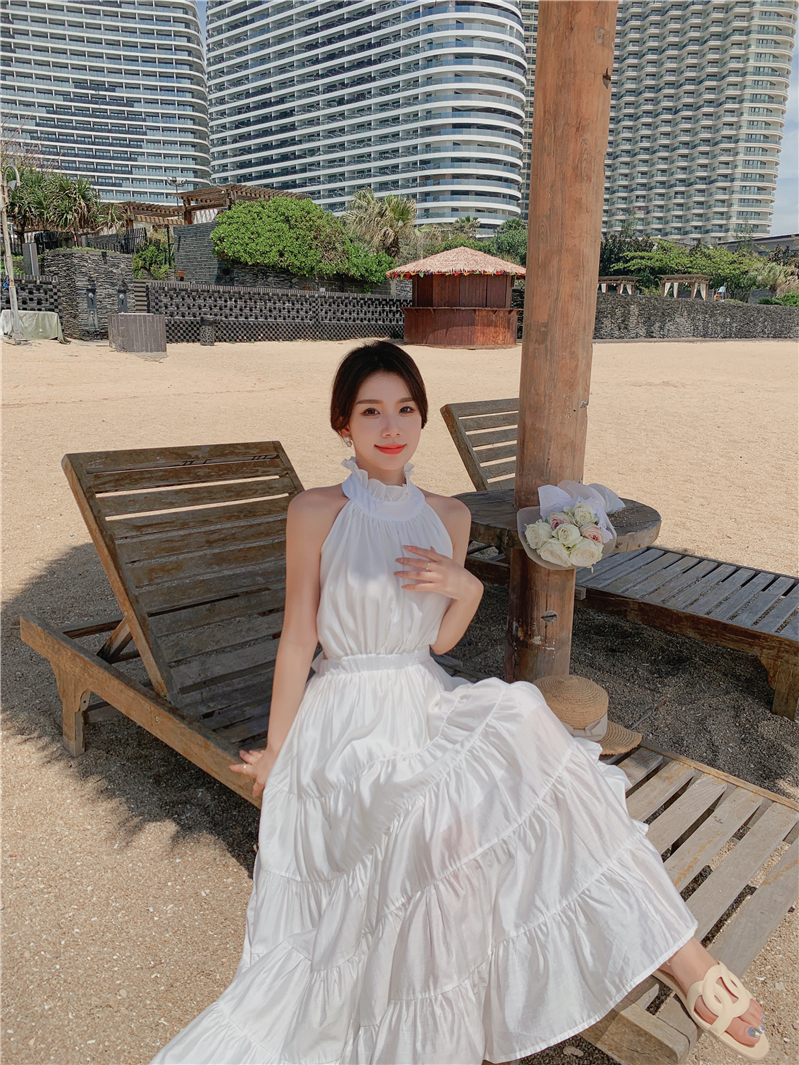 Yellow Backless Beach Vacation Dress, Slimming Long Skirt, French Design, Perfect for Sanya Travel and Summer Getaways Yellow Backless Beach Vacation Dress, Slimming Long Skirt, French Design, Perfect for Sanya Travel and Summer Getaways