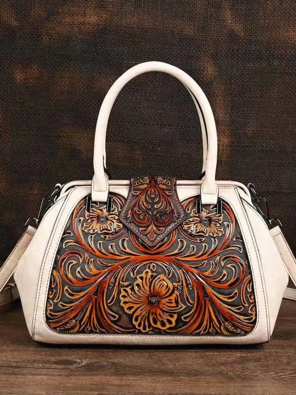 Retro Apricot Colored Cowhide Handmade Carved Handbag