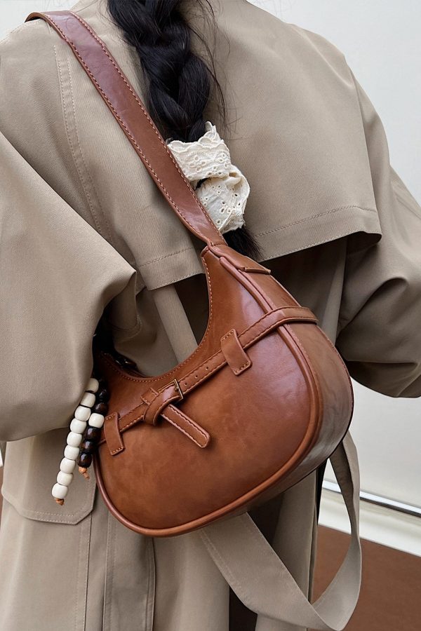 Unique Brown Tasseled Solid Durable Faux Leather Saddle Bag