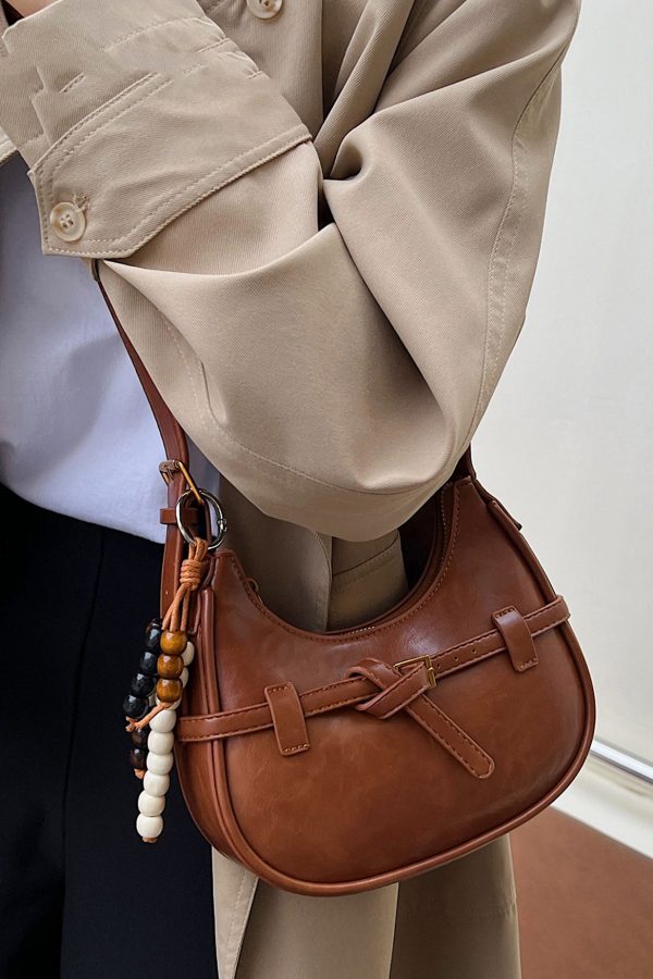 Unique Brown Tasseled Solid Durable Faux Leather Saddle Bag