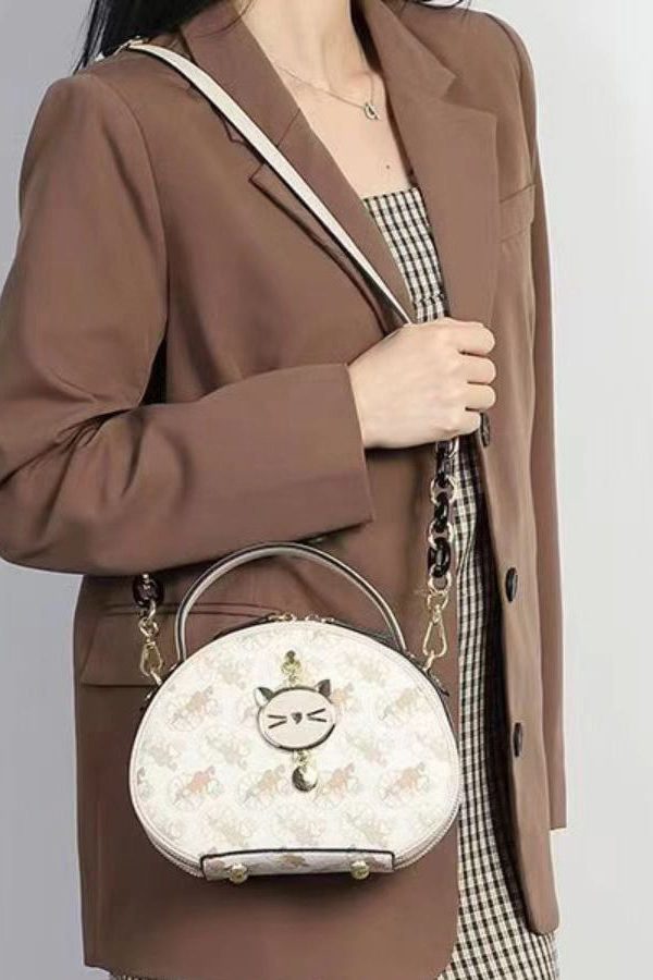 Women Beige Print Faux Leather Round Bag