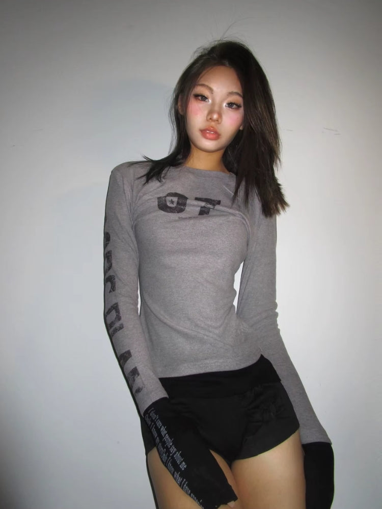 Grunge Style: Discover the Top Seven Shoulderpad Tops You Need Now